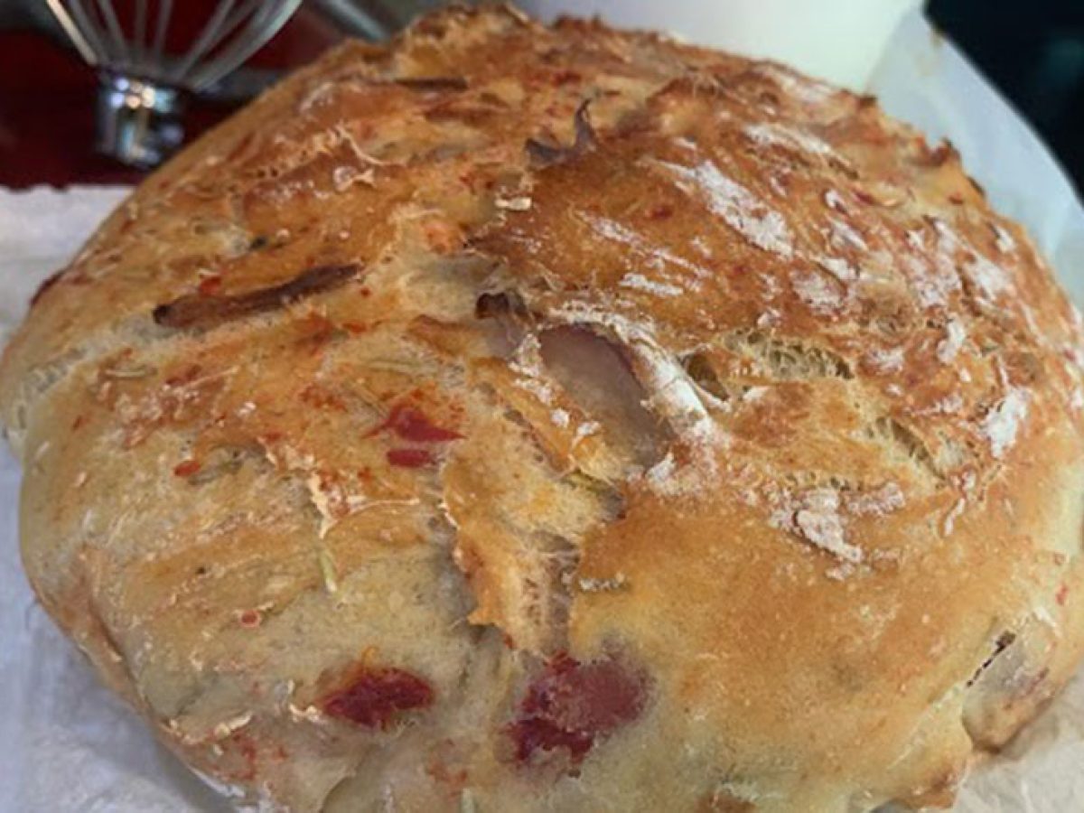 Roasted garlic asiago sourdough. Made in a Lodge Dutch oven and a